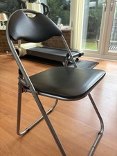Folding Chair With Black Faux Leather In  Very Good Condition