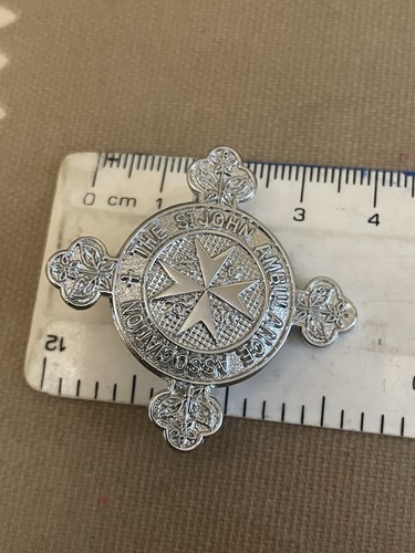 John ambulance silver badge - john,