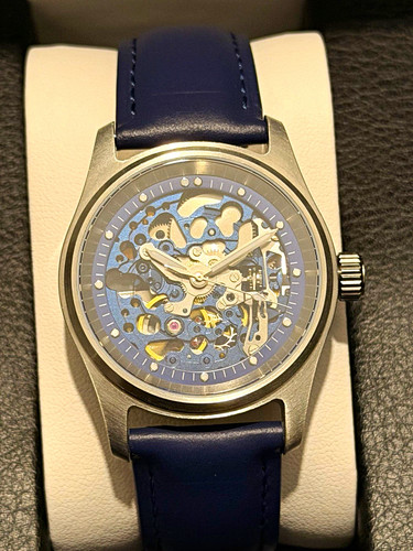Blue skeletonized watch - skeletonized, watch: