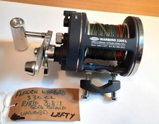 FLADEN WARBIRD 330CL (LEFT HAND) BOAT REEL LOADED WITH 50LB BRAID