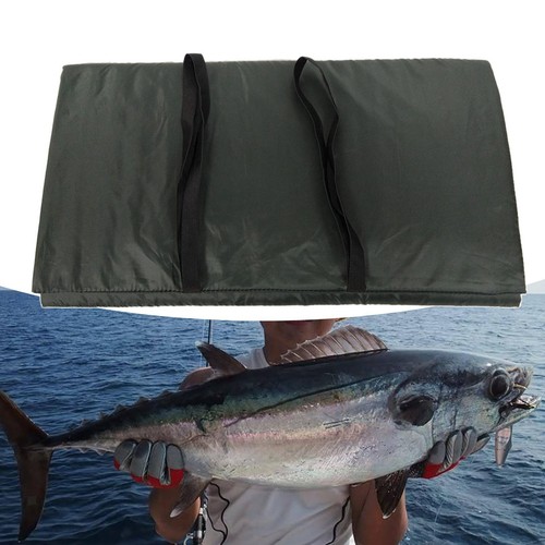 Unhooking mat carp - unhooking, fishing