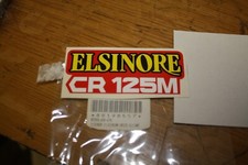 1976-77 NOS HONDA  CR125M ELSINORE SIDE COVER DECAL EMBLEM 87203-400-670 MX ERK