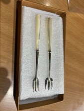A Pair of Solid Silver Pickle