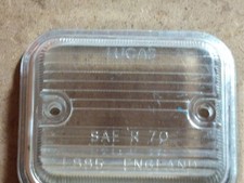 Lucas L885 Clear Lens. NOS/ VGC. Reverse Lights Etc. SAE Marked.