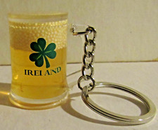 F) KEYRING PLASTIC BEER