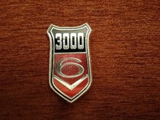 FORD CAPRI MK 1 . 3LITRES.  WING BADGE. 1975. 7.6CM X 4.4CM. NICE CONDITION.