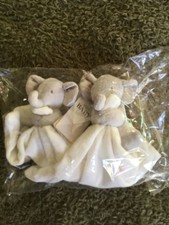 Two grey and cream, elephant