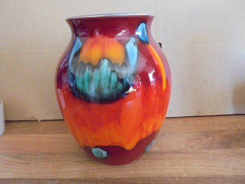 Poole pottery in tall - ,