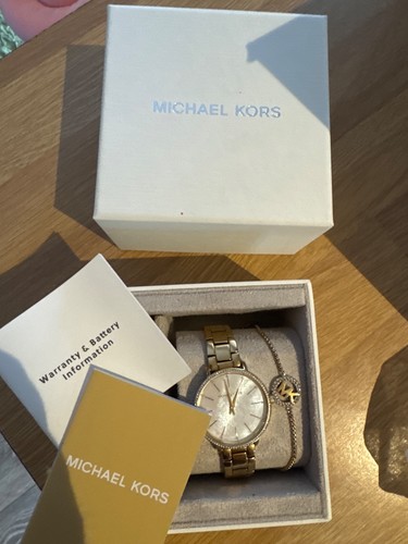 Michael kors gold watch - ,
