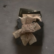 M&S Grey fascinator On Hair