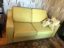 DFS 2 seater sofa-bed. Lime Green colour. Hardly used.