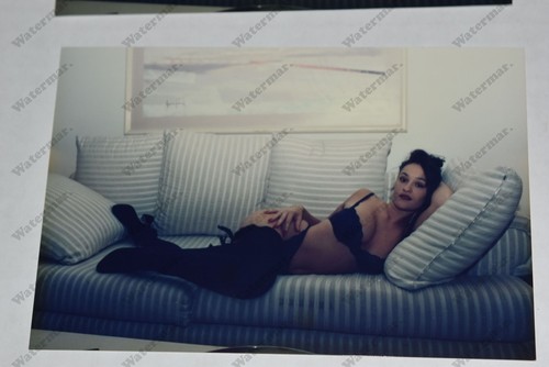 Curvy brunette woman laying - curvy,