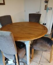 round oak dining table and 4 chairs 120cm round. Length when extended 160