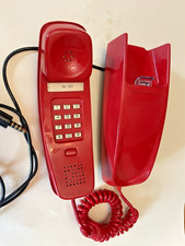 Vintage slimline red push button dial phone