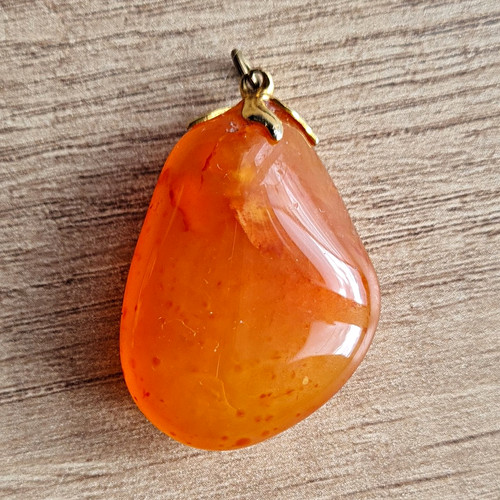 Orange amber teardrop charm - amber,
