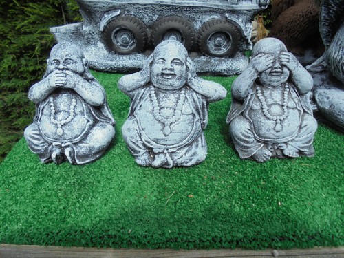 Three wise little buddhas - three,