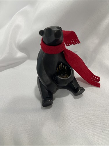 Wooden bear statue with - with, red