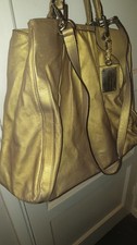 AUTHENTIC DOLCE GABBABA gold rouche HANDBAG good cONDITION WITH DUST BAG.
