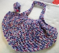 Crochet mesh market bag with cute piggy keychain, pink/lilac variegated yarn.