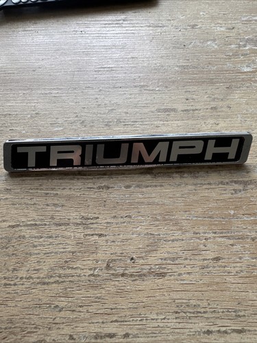 Triumph badge - triumph,