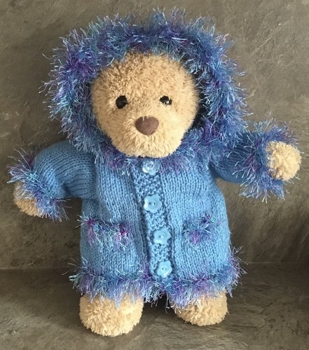 Hand knitted teddy bear - hand,