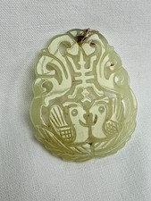 Fine Chinese 20th Century Carved Pale Celadon Jade Pendant with Gold Suspension.