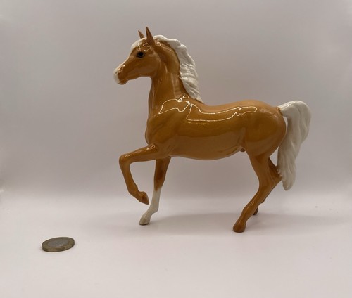 Beswick palomino prancing arab - prancing,