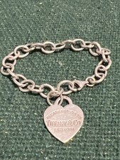 Please Return To TIFFANY & Co