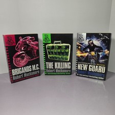 Set of 3 paper back books by