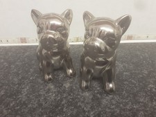 A SET OF 'PUGS' SALT & PEPPER POTS