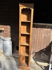 Tall narrow pine wooden bookcase
