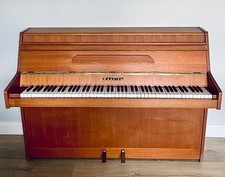 PRACTICAL MODERN UPRIGHT PIANO