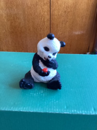 Panda holding ladybird - panda,