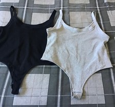 H&M,Size XL,2 x grey & black ribbed,pressed stud close thong,strappy body suits.