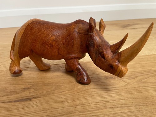 Hand carved wood wooden rhino - hand,