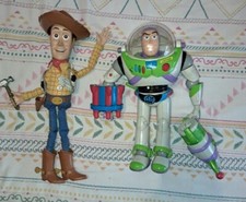 DISNEY PIXAR TOY STORY WOODY AND BUZZ LIGHTYEAR. Collectible action figures