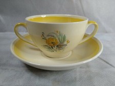 1950's New Hall Hanley Yellow Twin Handled Cup and Saucer 