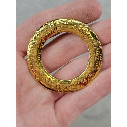 Chanel gold tone repeating - tone,