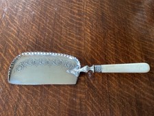 Vintage Ornate Silver Crumb