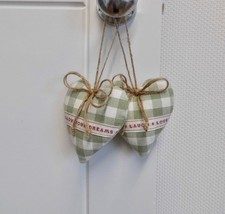 Two heart decorations green check 'live laugh' 'follow your dreams' hearts