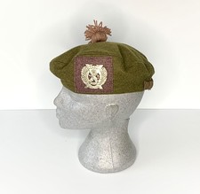 Tam O Shanter & Badge. The