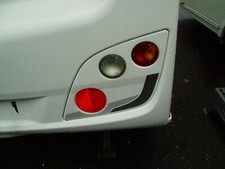 CARAVAN OFFSIDE REAR LIGHT SET SWIFT CHARISMA 2010