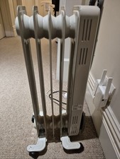 Oil filled radiator heater - ,