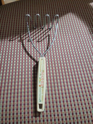 Vtg floral potato masher - floral,