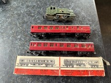 Playcraft OO/HO Vintage clockwork tank loco and 2 Red Coaches.