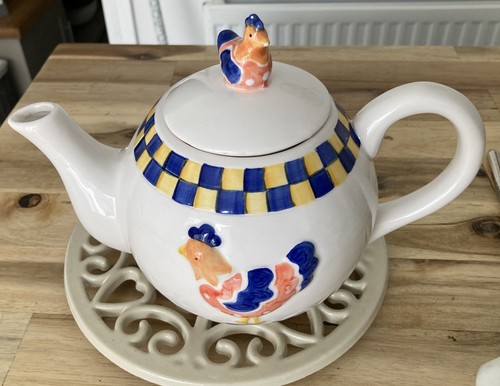 Rayware teapot decorated with - teapot,