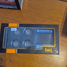 IXO 18SET001W 'SET OF 4 MINILITE WHEELS & STAND' 1:18. MIB/BOXED