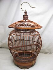 small vintage bird cage carved