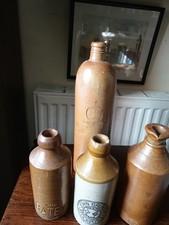 Group Of Old Stoneware Bottles