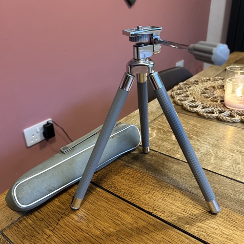 Camera tripod with original - in,